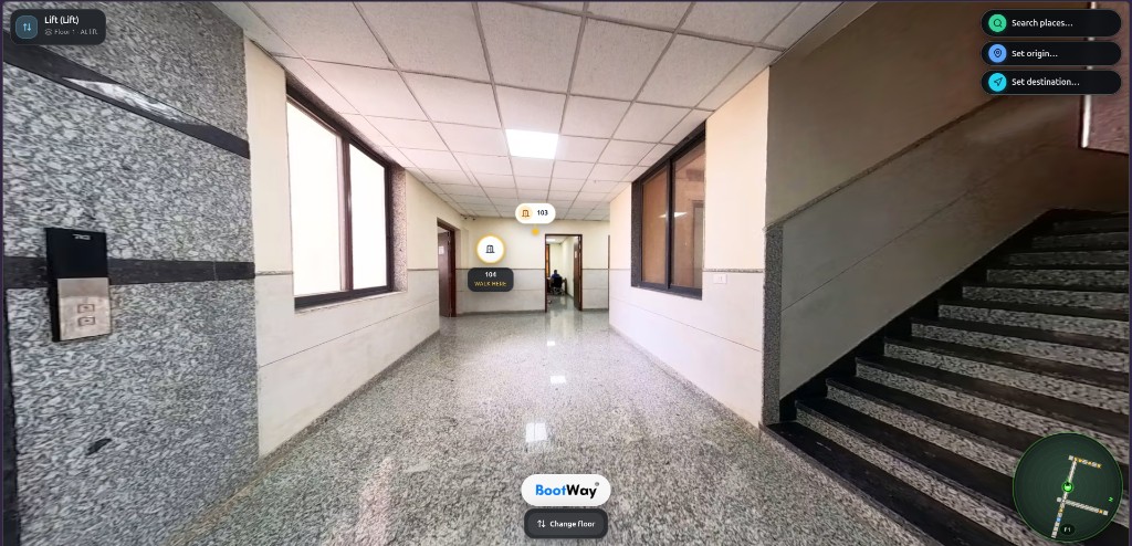 Corridor by the lift with stairs and floor mini-map